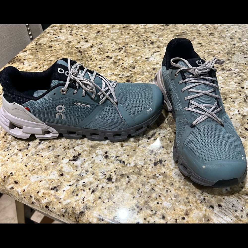 On running shoes 
Cloudflyer Waterproof
Sea | Glacier
Size: 8 (Women's)